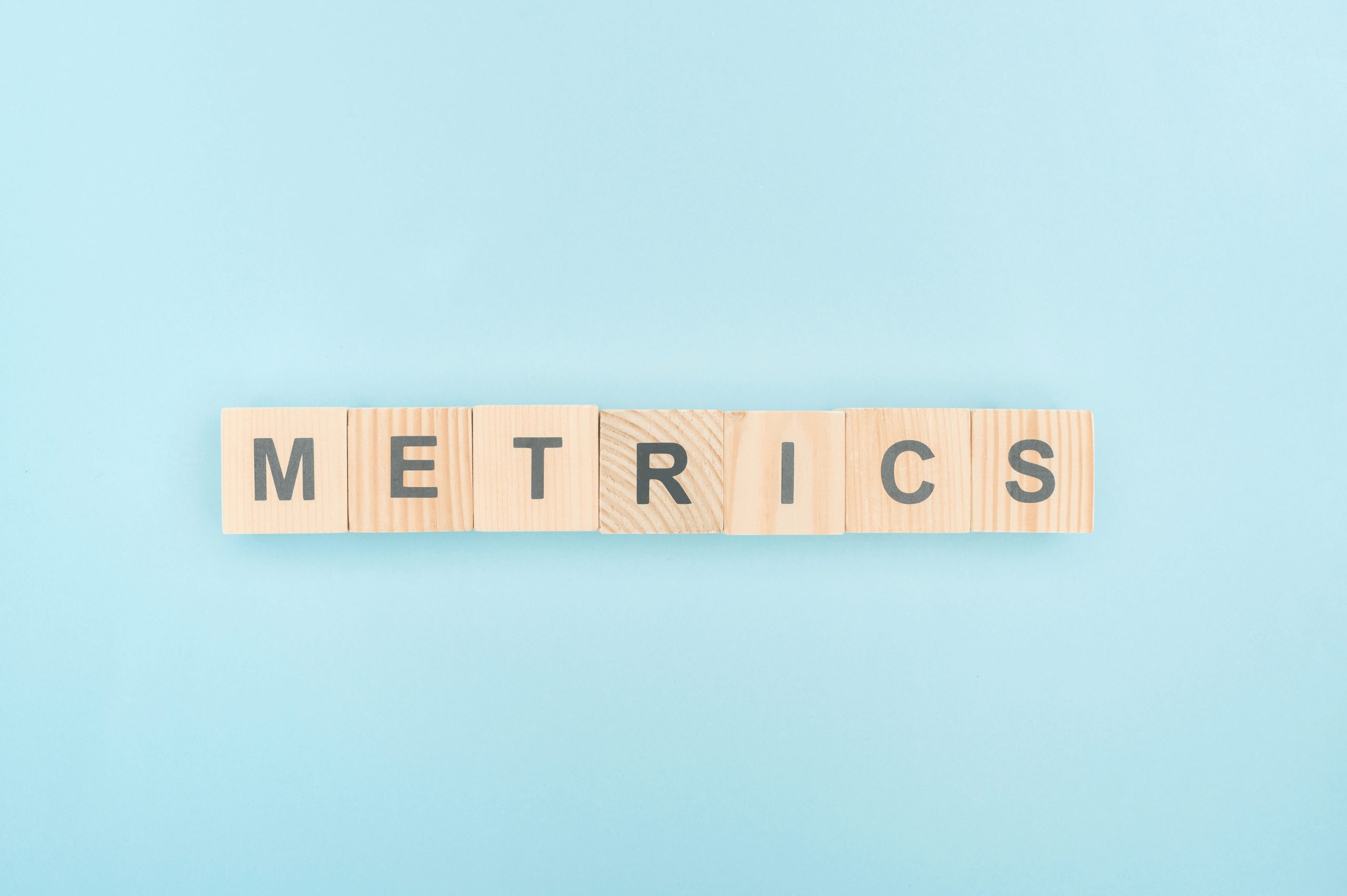 Metrics on a light blue background