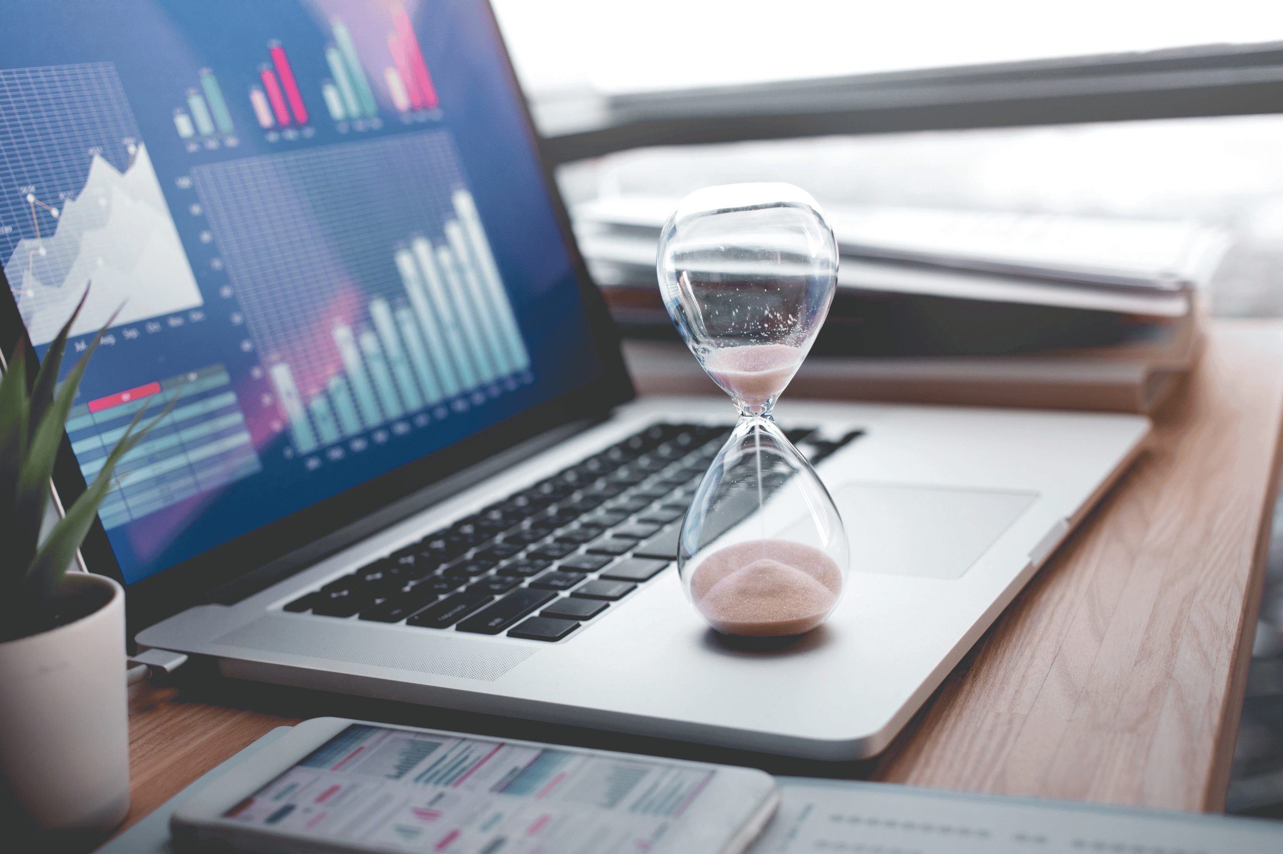 Hourglass on a computer laptop